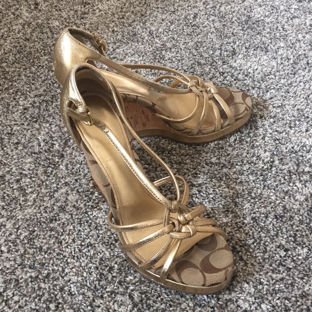 Gently used Coach Gold Wedges 7.5